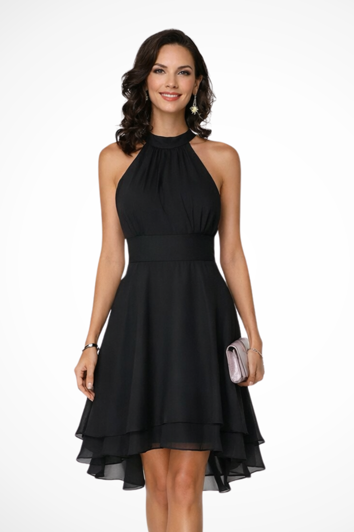 Flirty women's halter neck tiered mini dress with ruffle hem, ideal for summer parties & date nights.