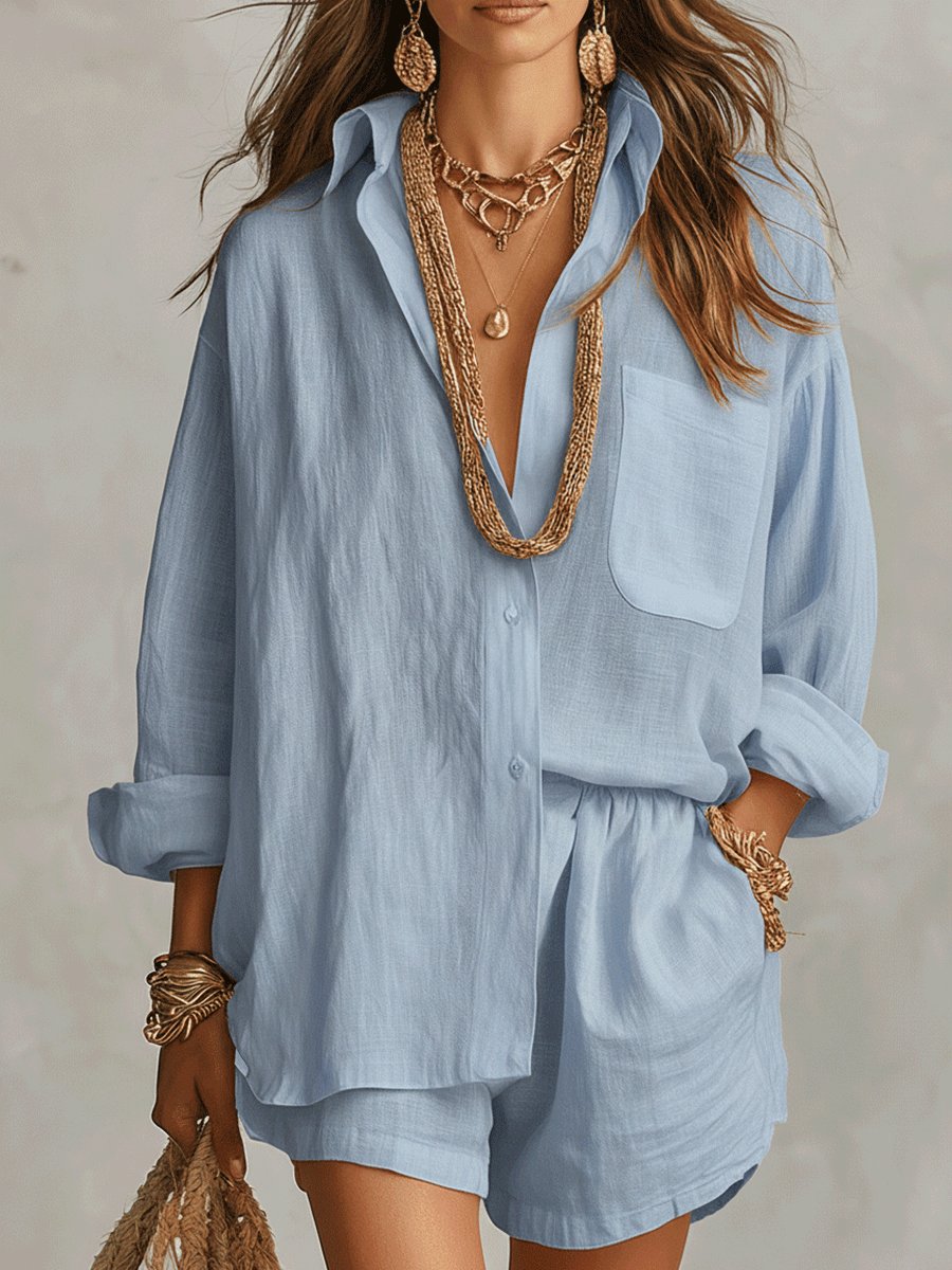 Relaxed fit women's linen two-piece set featuring an oversized button-up shirt and matching shorts, ideal for beachwear.