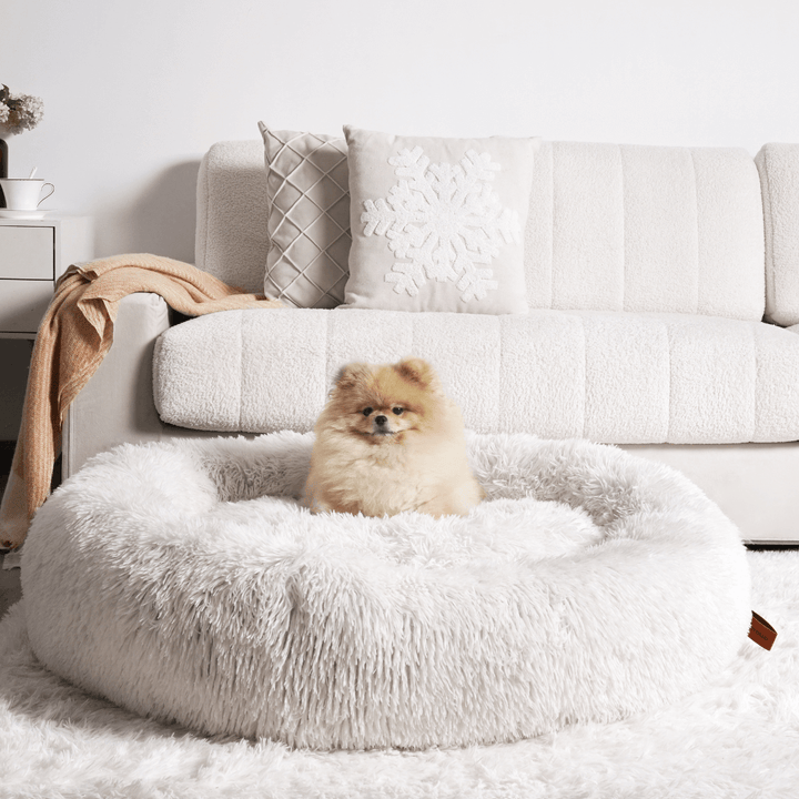 Soft & warm fluffy dog bed, donut shape, for ultimate pet comfort & deep sleep. Calming anxiety relief.