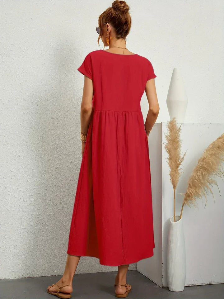 Versatile women's midi dress, flowy, relaxed fit & elegant for everyday comfort.