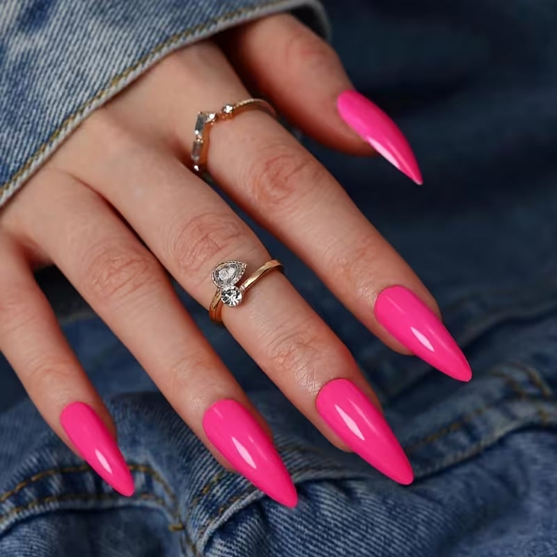 Fluorescent pink press-on nails for women, professional artificial manicure kit for easy DIY nail art.