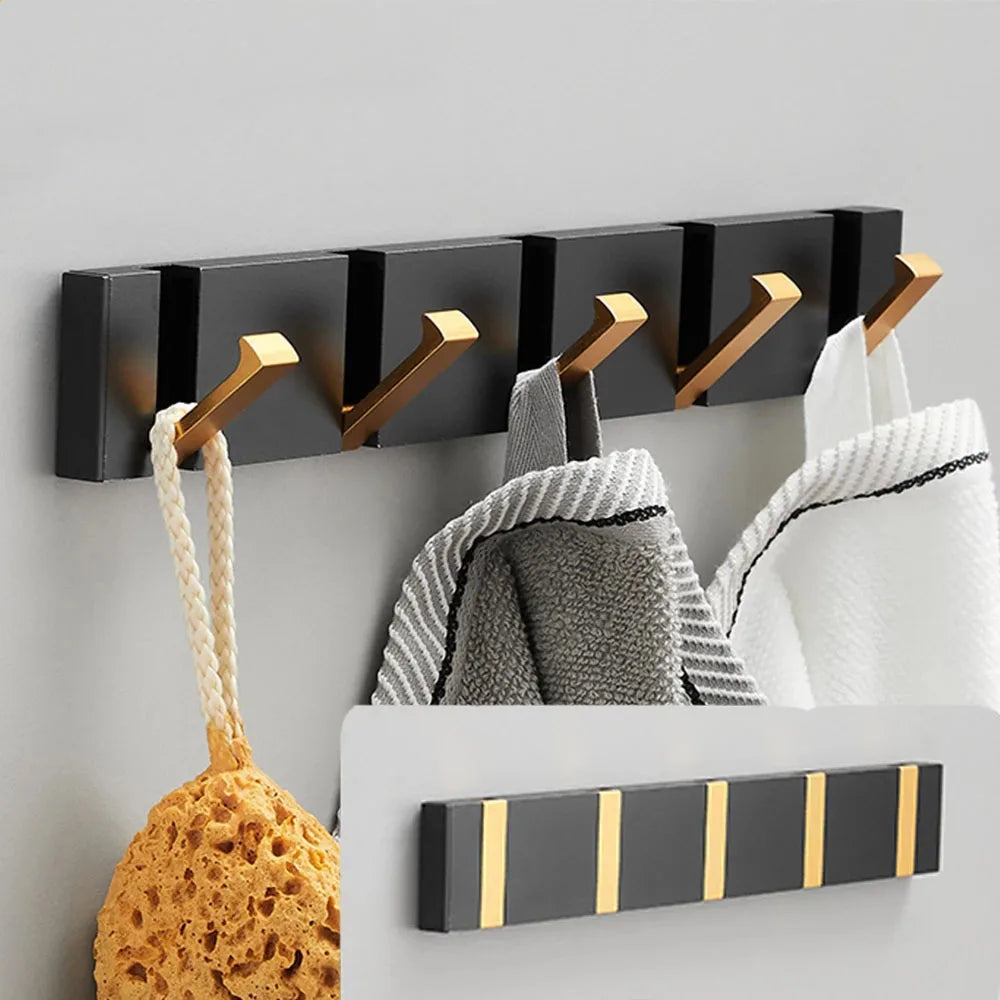 Foldable wall hook for entryway, saving space & organizing coats, bags, modern decor.