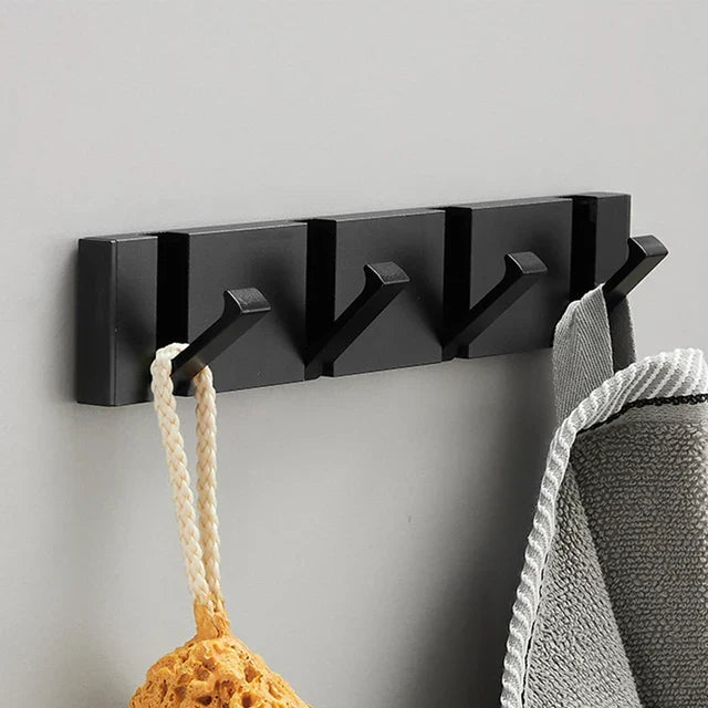 Sturdy foldable wall hook for heavy coats, maximizing closet or entryway space, modern.