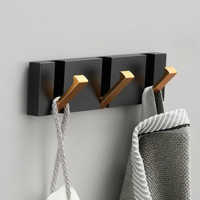 Versatile foldable wall hook, perfect for coats, towels, or bags in any room, space saving.