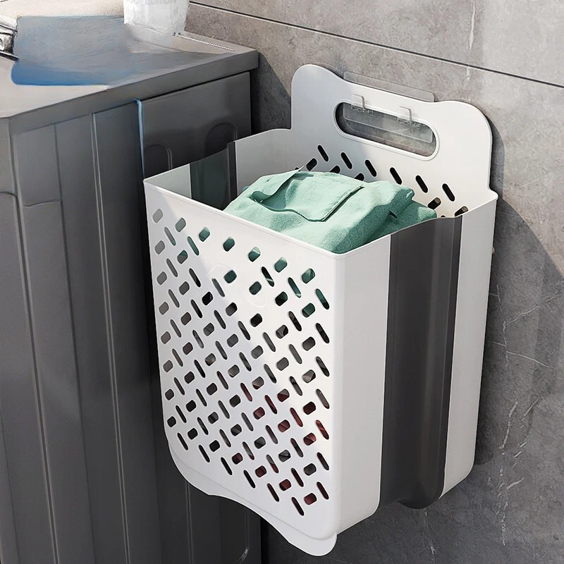 Collapsible mesh laundry basket, perfect for wall mounting, offers a breathable and space-saving solution for dorm rooms.