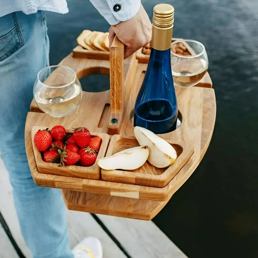 Unisex wooden picnic table with integrated wine glass & bottle holders for secure outdoor serving.