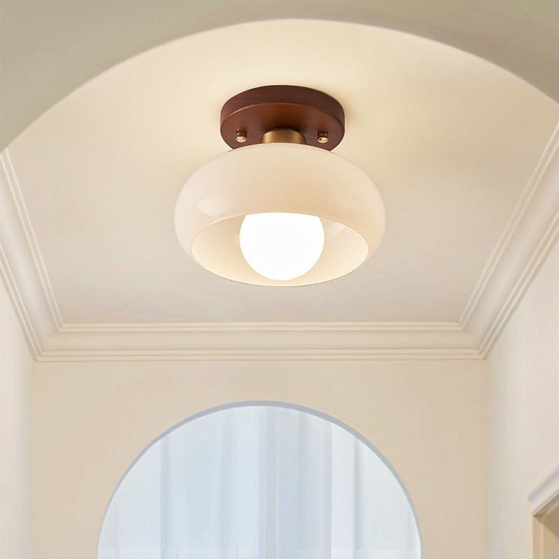 Modern French Bauhaus ceiling lamp with stylish wooden accent and soft, warm glow for contemporary homes.