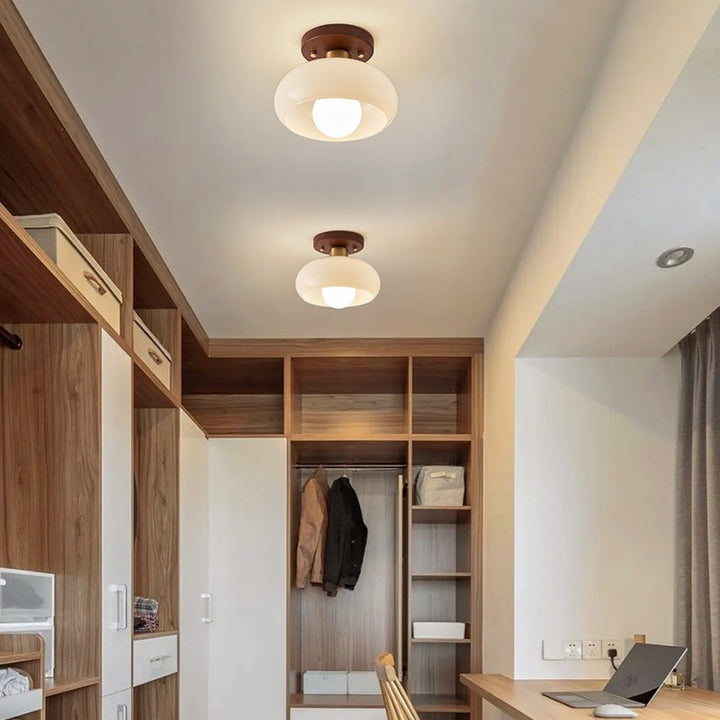 Stylish French Bauhaus ceiling lamp for living room, bedroom, or entryway; offers warm, atmospheric lighting.