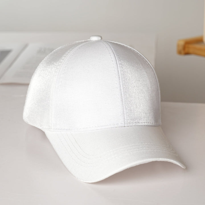 Back view of an adjustable women's satin cap, ideal sporty headwear for sun protection & active outdoor style.