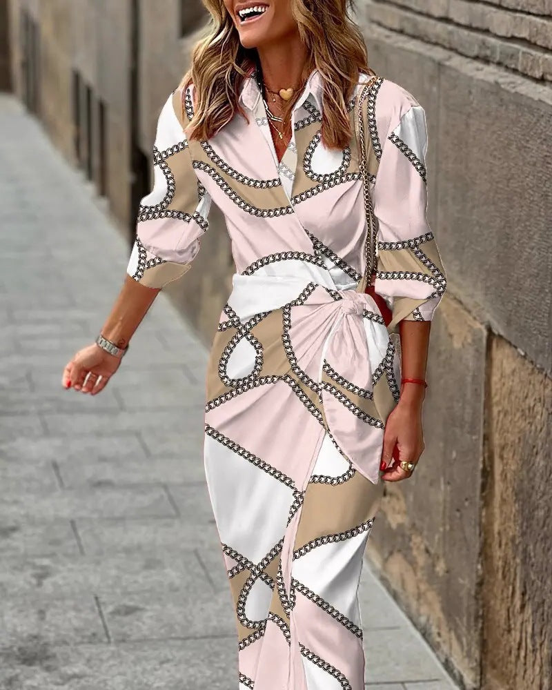 Vibrant women's spring midi dress with an elegant wrap design & chic collar. Perfect for warm weather styling.