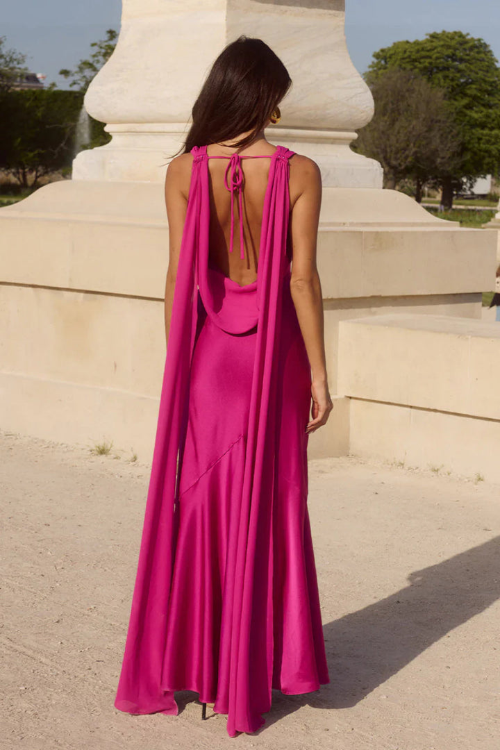Women's wedding guest fuchsia maxi dress, featuring a chic cowl neck and alluring open-back design.