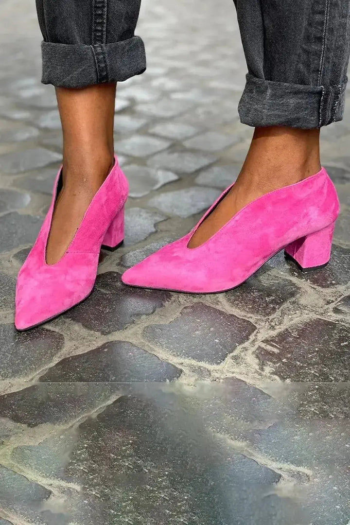 Fuchsia women's block heel court shoes with pointed toe; elegant footwear for office or evening.