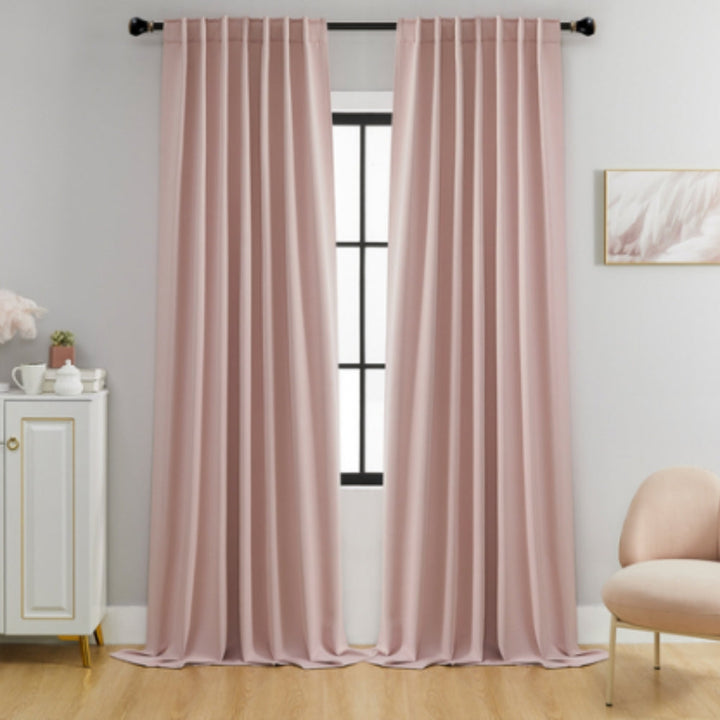 Durable black thermal window curtains, offering long-lasting blackout performance and energy cost savings.