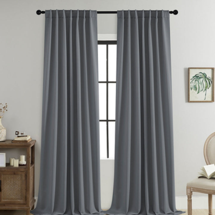 Energy-saving microfibre thermal blackout curtains with rod pocket, perfect for window treatment & noise reduction.