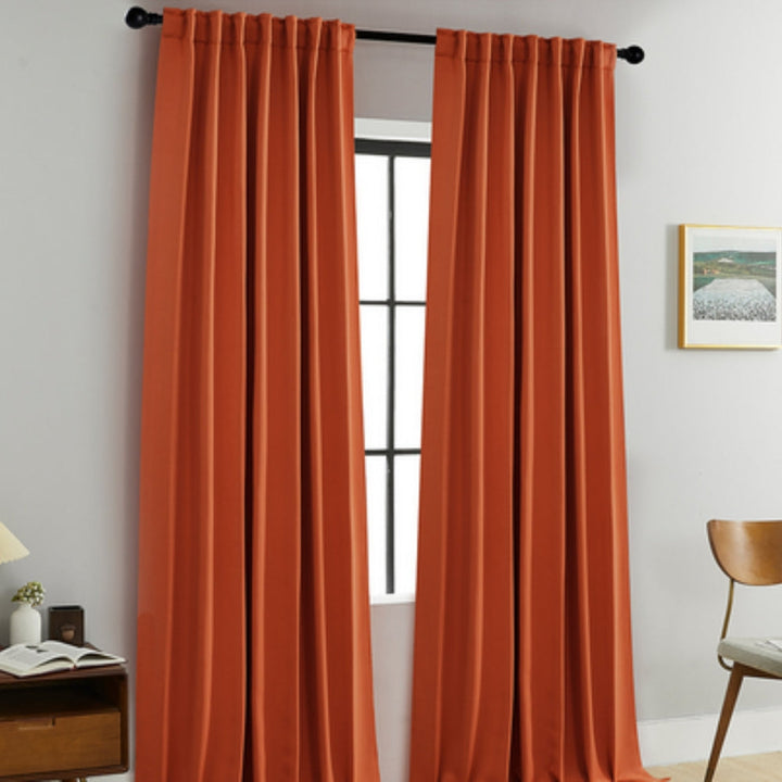 Elegant black thermal blackout curtains, ideal for home decor, providing darkness and insulation for any room.