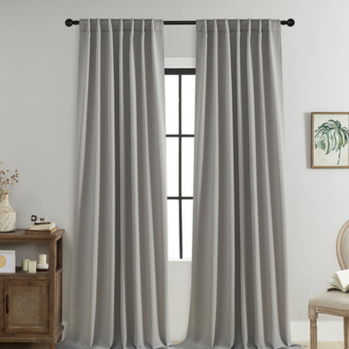 Premium black thermal drapes, ensuring enhanced home comfort, privacy, and reduced energy bills.