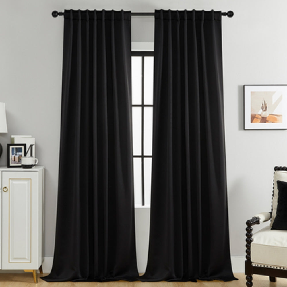 Dark black thermal curtains for ultimate light blocking, perfect for bedroom sleep or living room movies.