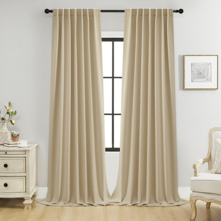Rod pocket black thermal blackout curtains, easy to install, offering superior insulation and noise dampening.