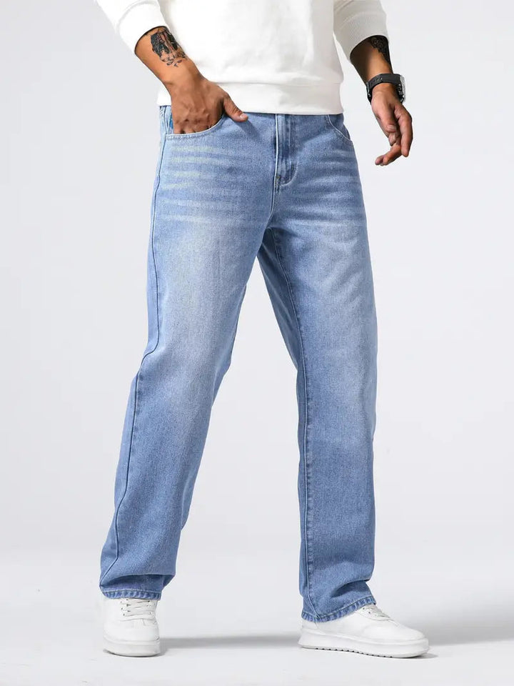 Full shot of men's stretch jeans, dark blue denim, showcasing comfortable & flexible regular fit. Ideal for casual wear.