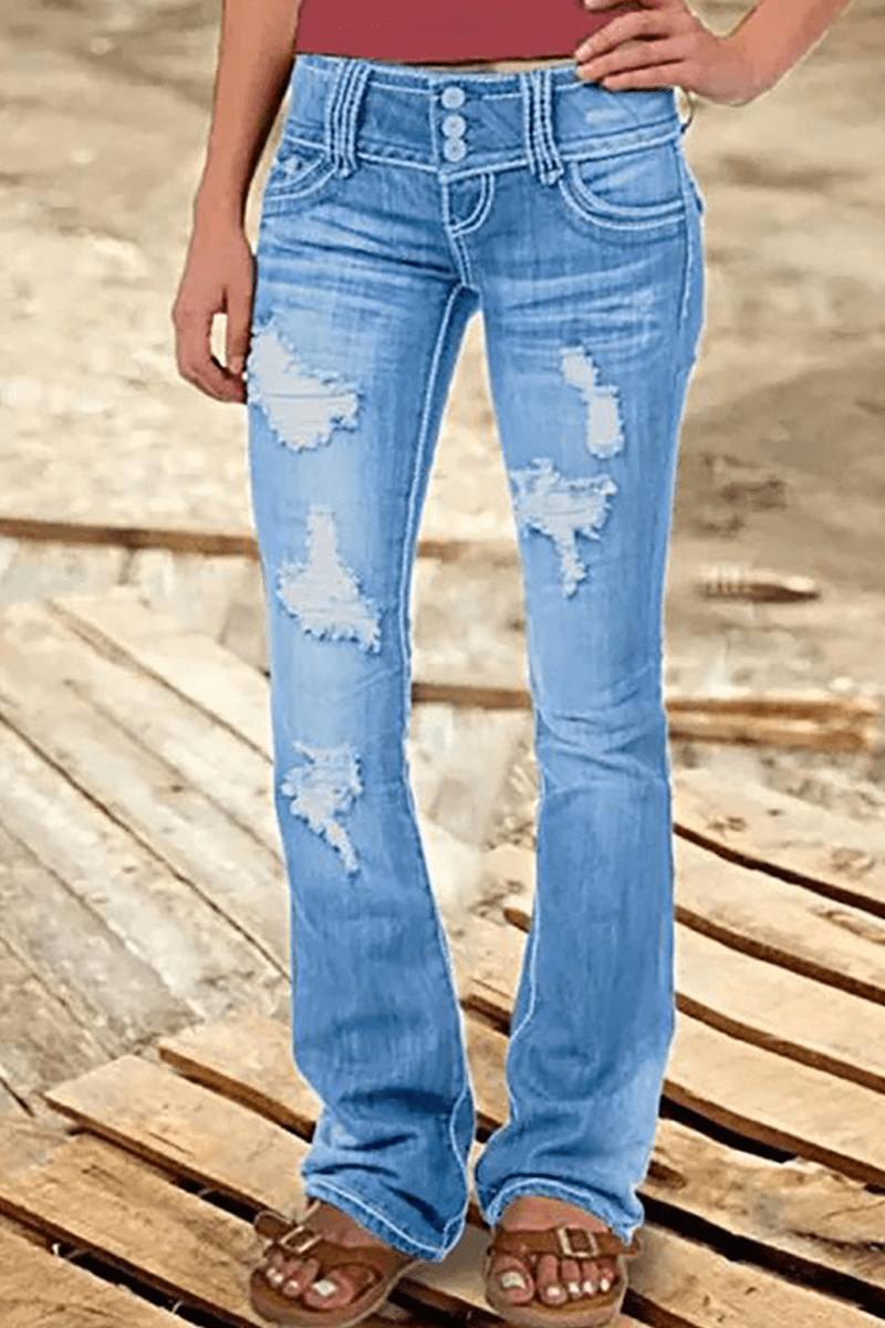 Model wearing Women's Ripped High-Waisted Bootcut Jeans, showcasing bootcut fit & casual style.