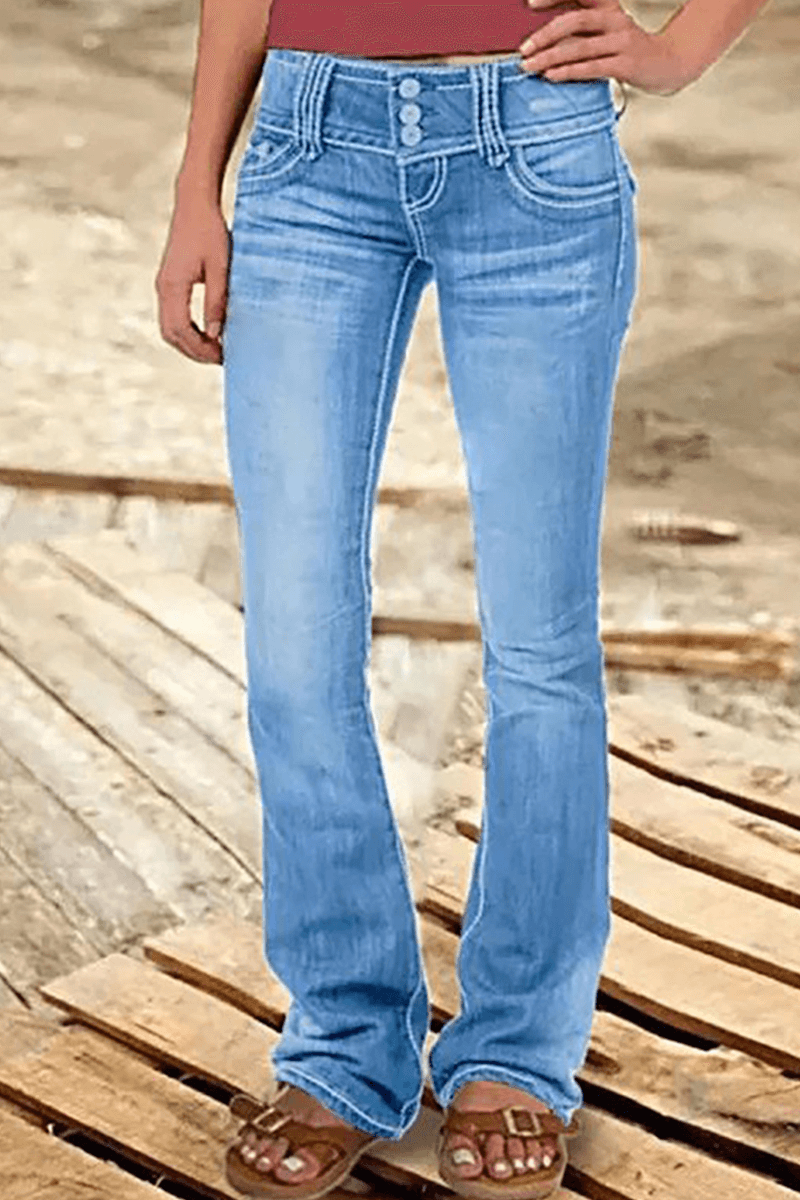 Trendy women's jeans: high-waisted, ripped, and bootcut, perfect for a modern casual look.
