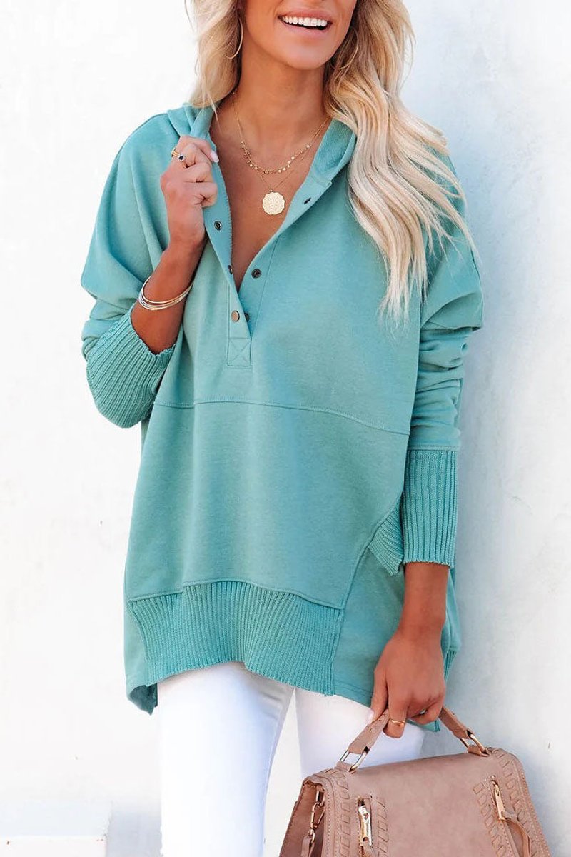 Paired with leggings: Women's cozy longline hooded sweatshirt tunic, perfect for ultimate casual comfort.