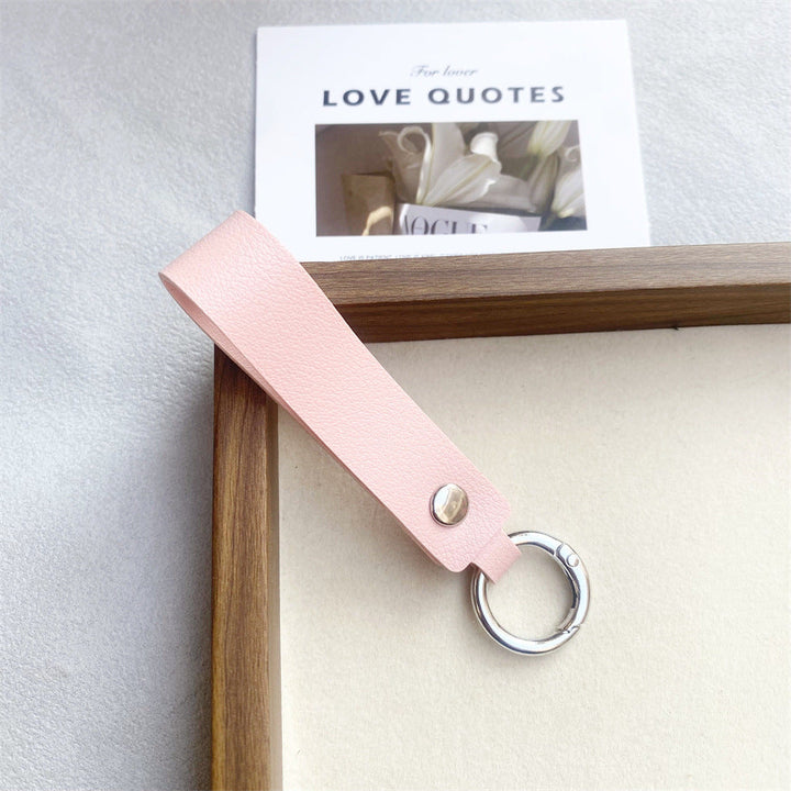Durable genuine leather key holder. Minimalist design, stylish unisex everyday carry accessory.