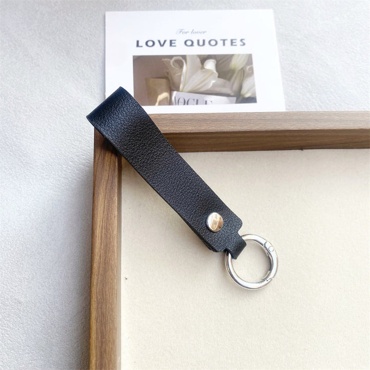 Elegant minimalist genuine leather key organizer. A durable unisex accessory for modern living.