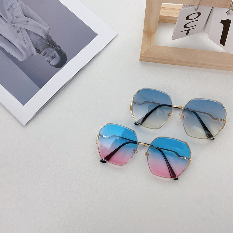 Trendy geometric shades with UV protection, a cool fashion accessory for any unisex outfit.
