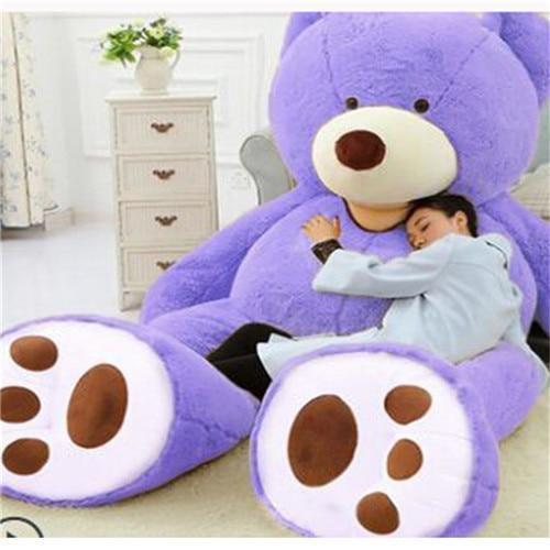 Unisex giant cuddly teddy bear, huge plush stuffed animal, ideal kids toy or home decor accent. Soft & huggable companion.
