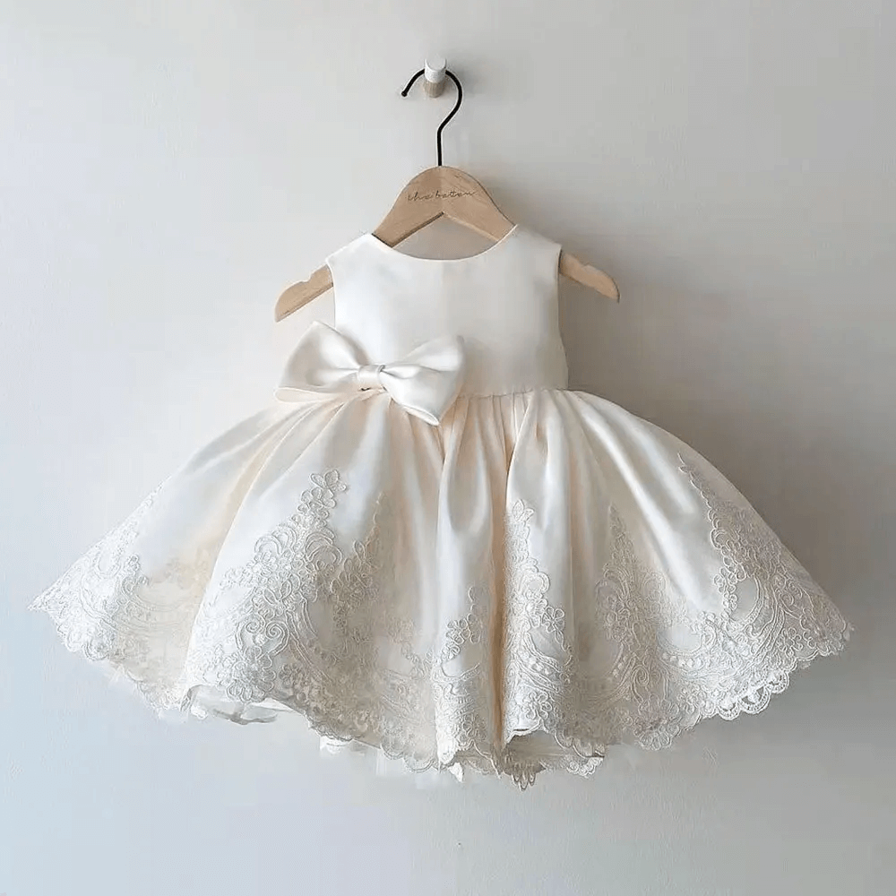 Girls' Aurora princess dress with elegant lace, large bow, perfect for parties, birthdays, or flower girl role.