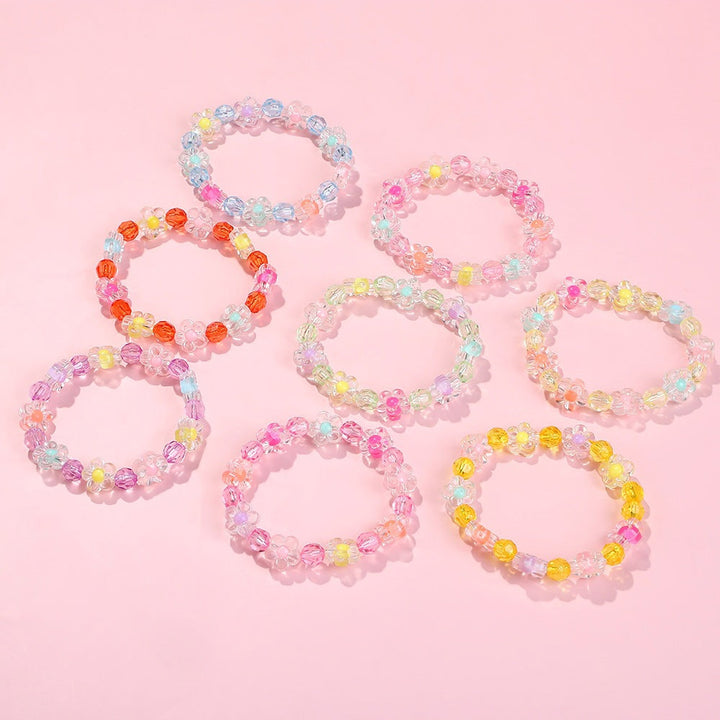 Elastic friendship bracelet for girls, adorned with cheerful flower motifs and bright beads.
