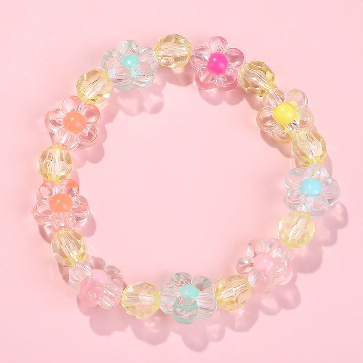 Elastic girls' bracelet with intricate flower motifs and a playful, colorful design.