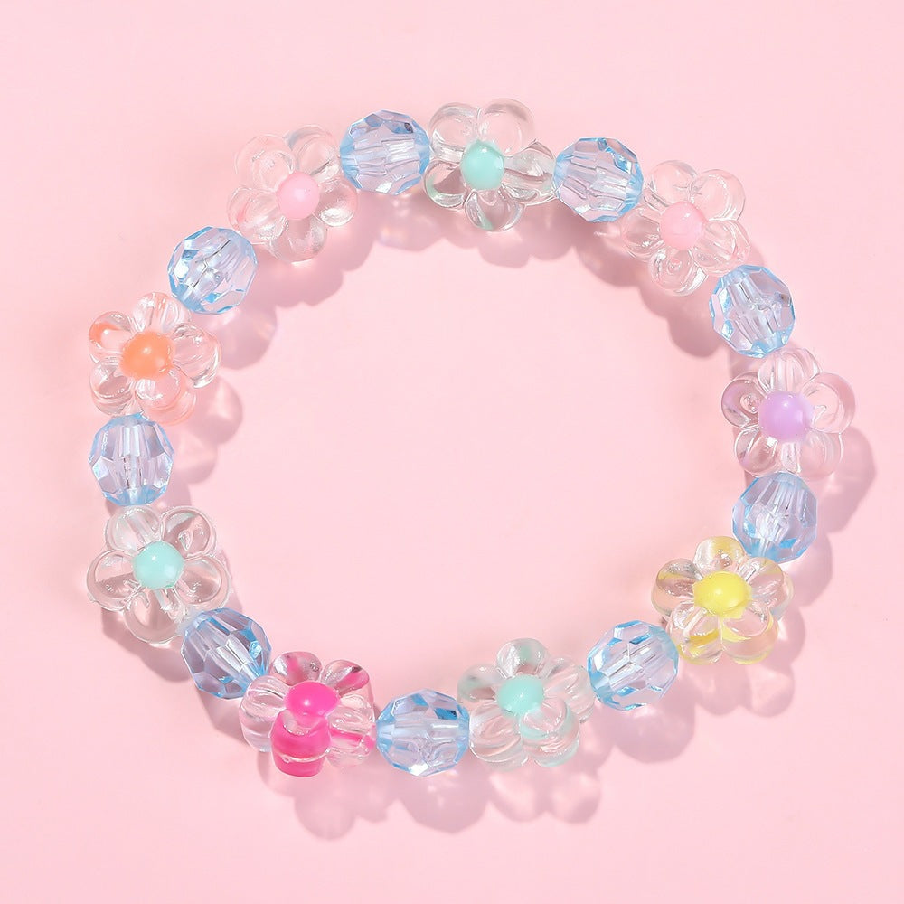 Vibrant floral bracelet featuring diverse colorful flower motifs, perfect for any occasion.