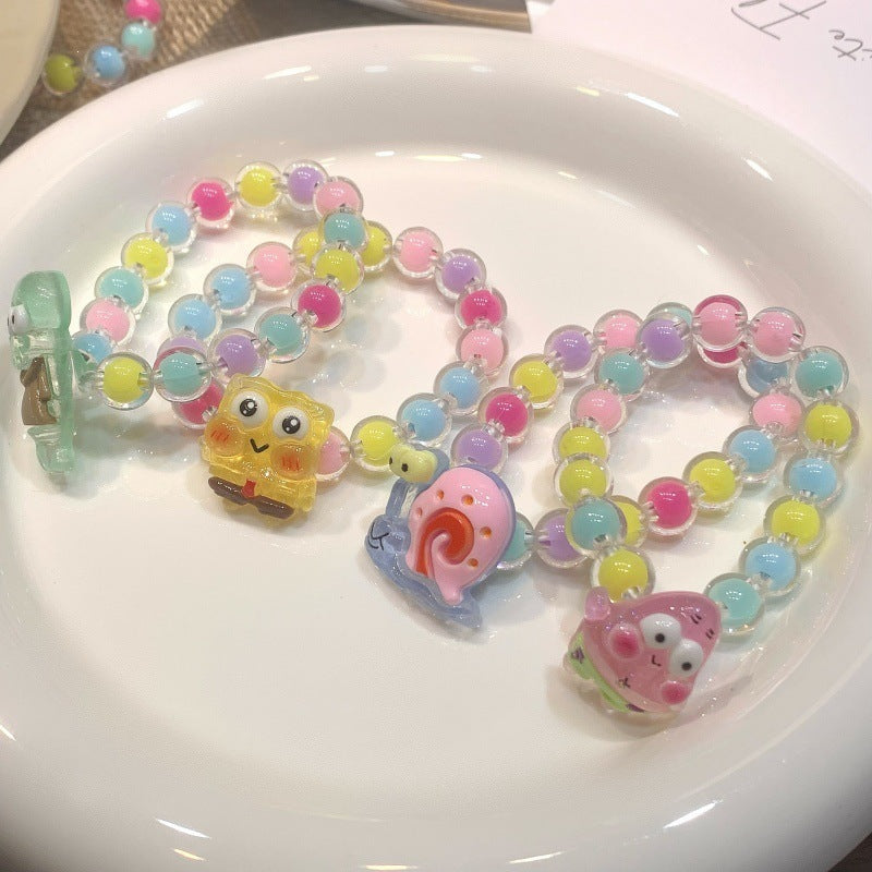 Girls' colorful plastic cartoon pendant bracelet, elastic and playful kids' jewelry.
