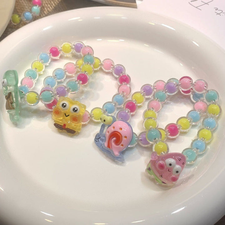 Girls' colorful plastic cartoon pendant bracelet, elastic and playful kids' jewelry.