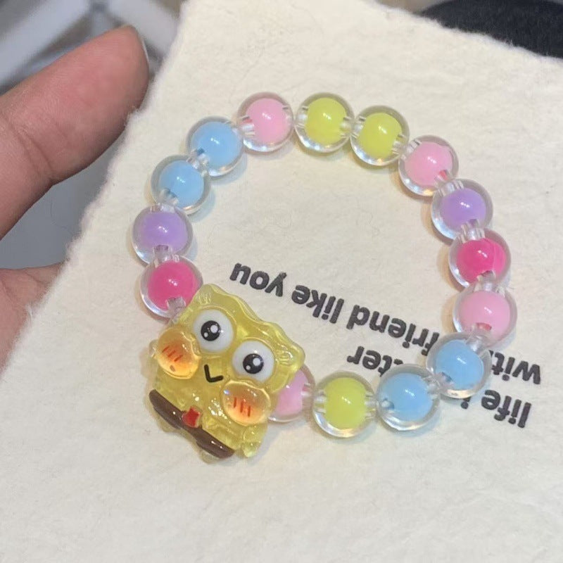Elastic plastic bracelet for girls, adorned with cheerful and colorful cartoon character pendants, kids' jewelry.