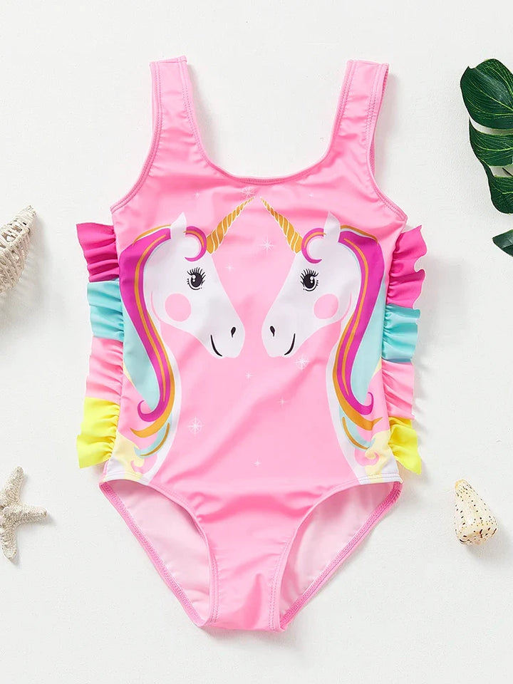 Vibrant girls' unicorn mermaid swimwear, stretchy for active 4-8 summer pool fun.