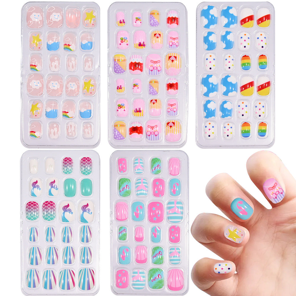 Fun and easy DIY manicure with playful cartoon nail art stickers for girls.