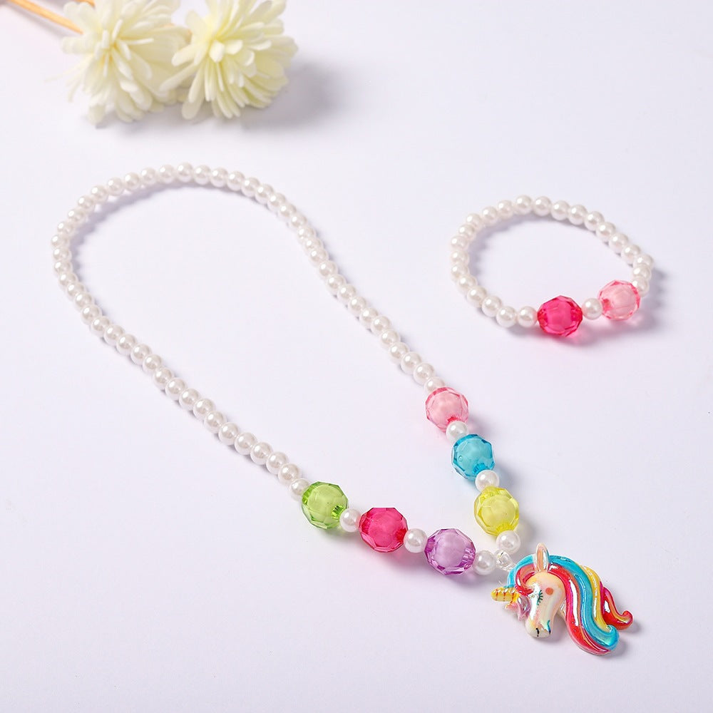 Kids' unicorn charm jewelry set, perfect for young girls' birthdays or as a fun, everyday children's accessory.