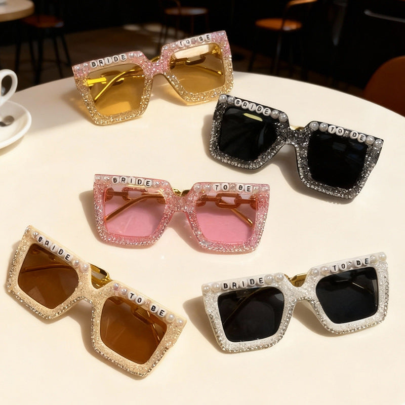 Stylish women's bridal sunglasses with pearl & rhinestone details, perfect wedding accessory, UV protection.