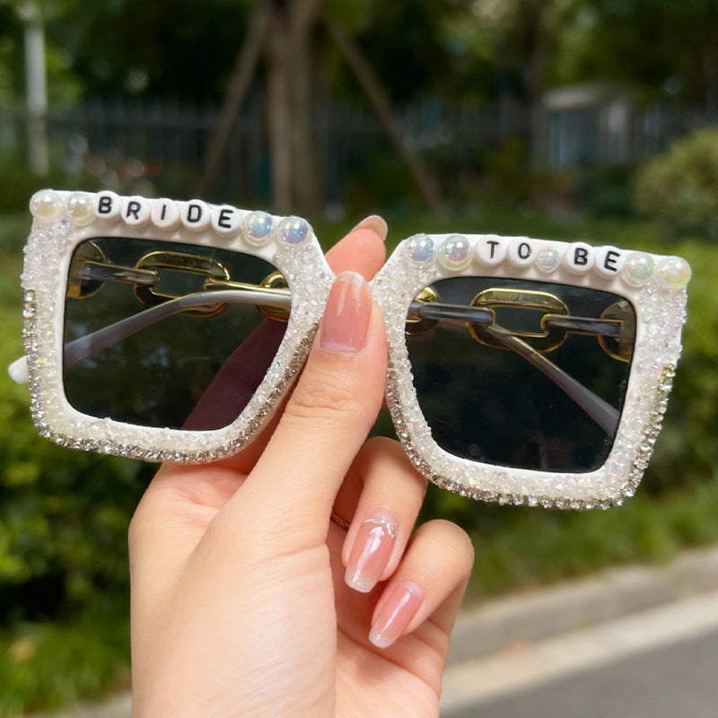 Glamorous women's fashion sunglasses with pearls & rhinestones, perfect for bridal themes & parties.
