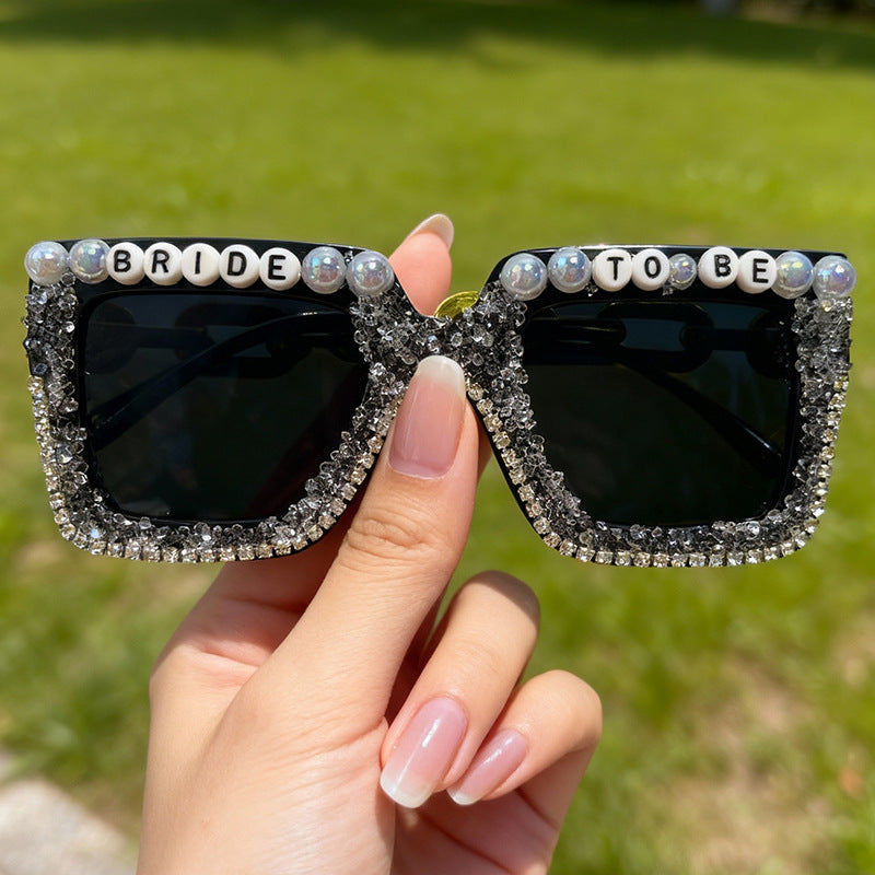 Unique women's bridal celebration sunglasses, embellished with pearls & rhinestones for special occasions.