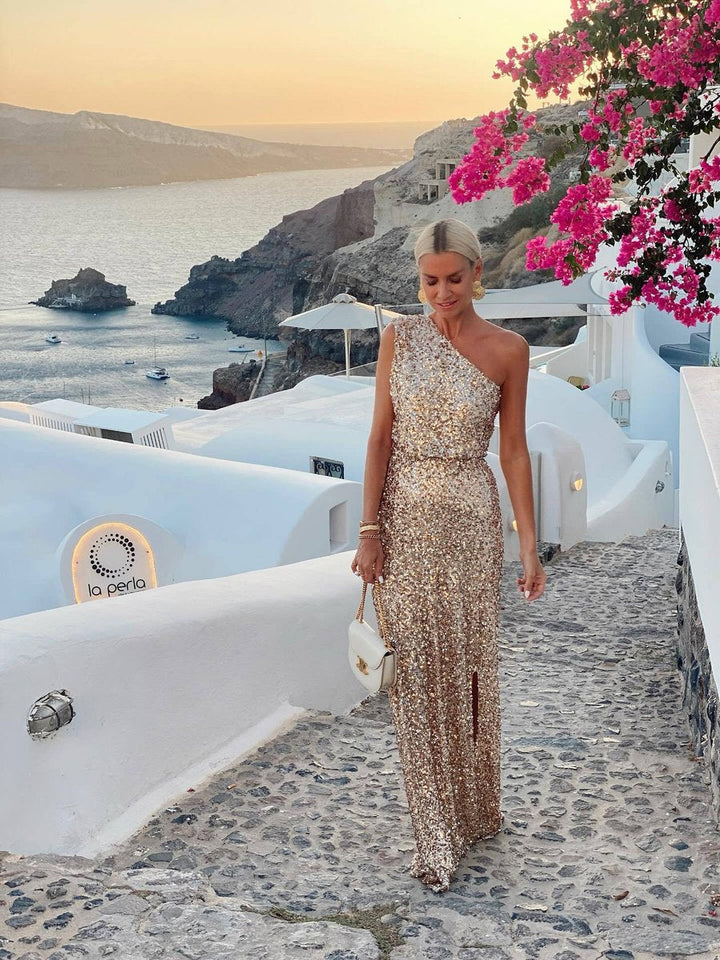 Sophisticated women's one-shoulder champagne maxi dress. Versatile cocktail or evening gown with a sexy side slit.