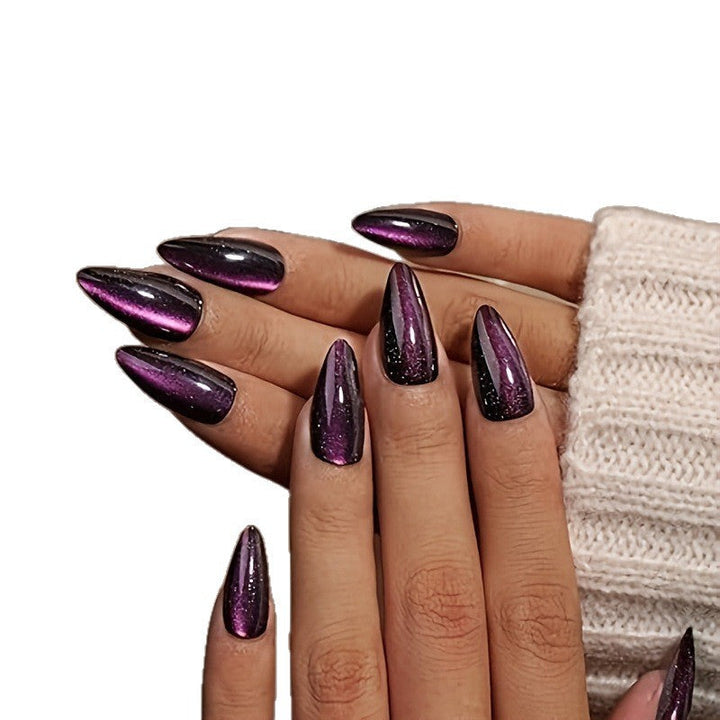 Elegant purple glitter stiletto press-on nails with an ombre effect. Glamorous artificial nails for women's manicures.