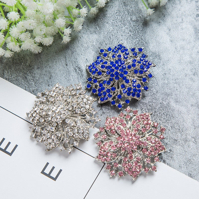 Glamorous women's crystal brooch pin with sparkling rhinestones, perfect elegant fashion accessory.