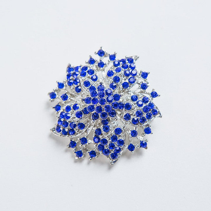 Vibrant crystal brooch for women's fashion, an elegant pin accessory that makes a statement.