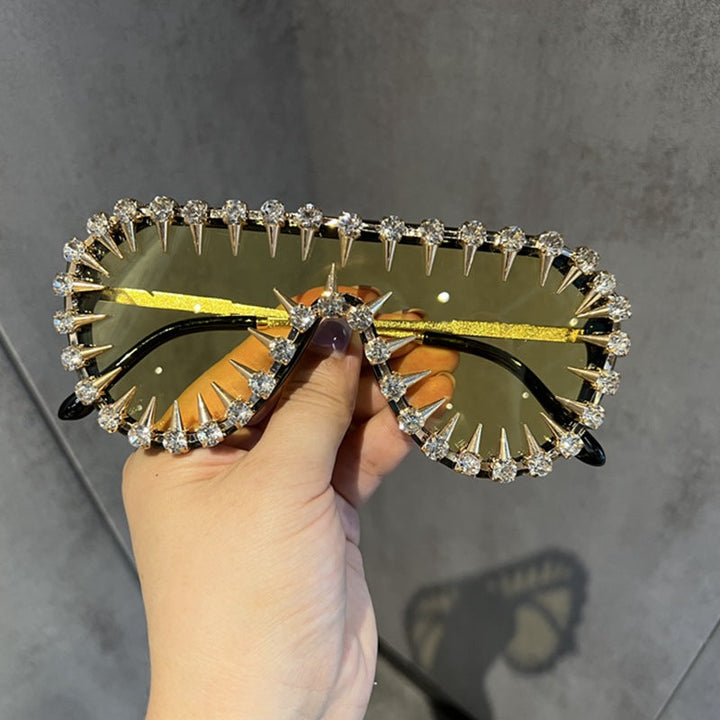 Chic women's glamorous cat-eye sunglasses, adorned with glitter & rhinestones. Essential summer fashion eye wear with UV.