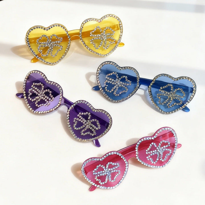 Fashionable women's heart sunglasses, full of rhinestones for a glamorous look.