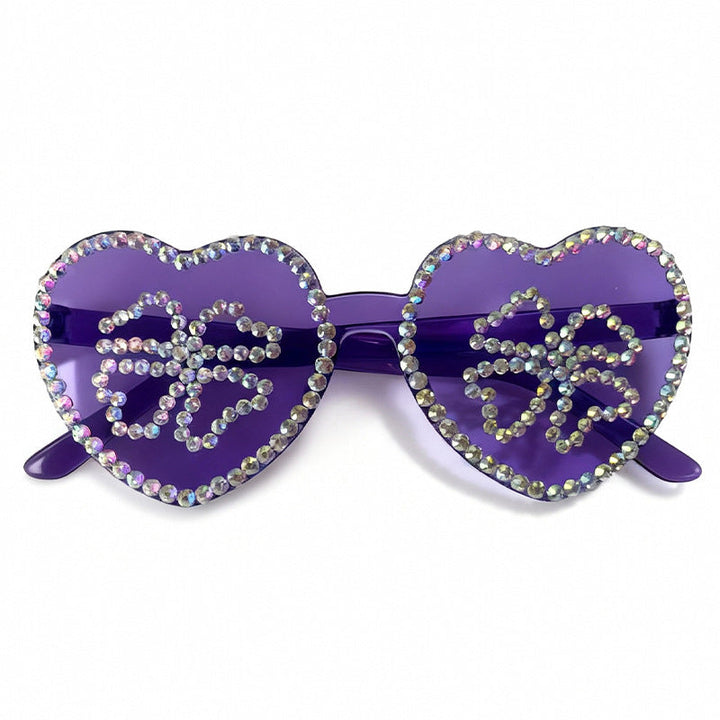 Sparkling rhinestone heart sunglasses for women, offering chic UV protection.